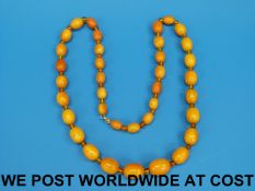 An amber necklace with graduated oval be