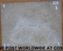 A fossil slab inset with possibly trilob