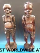 A pair of ebony figures of African fishe