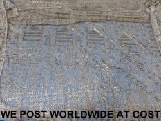 A large lace shawl with silver thread de