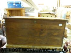 A 19thC pine travelling trunk with handl