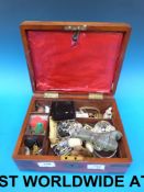 A brass mounted box with costume jewelle