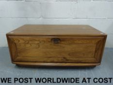 An Ercol televison stand (width 91cm, de