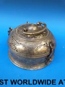 An Arabic brass incense burner with pier