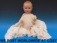 An Armand Marseille doll with open mouth