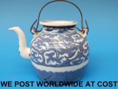 A 19thC Chinese blue and white tea pot