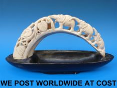 A hippopotamus ivory tusk inset into an