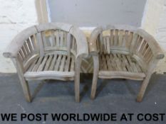 Two teak garden chairs