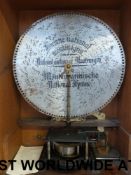 An upright 19 5/8 Polyphon music box No.