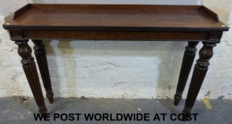 A 19thC mahogany hall or buffet table wi