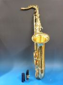 A cased Yanagisawa tenor saxophone with
