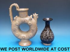 An Chinese olive glazed phoenix headed e