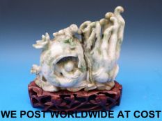 A Chinese jadeite carved brush pot in th