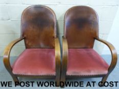 A pair of Art Deco leather-backed hardwo