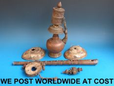 A Tibetan teapot with prayer scroll and