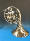 A Venus French horn with four rotary val