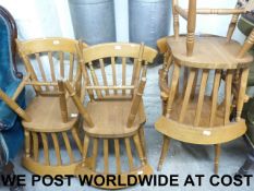 A set of six oak solid seat Windsor kitc