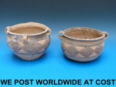Two Chinese Neolithic pots, one with fou