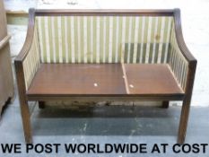 An Edwardian upholstered sofa (length 92