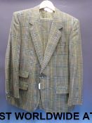 A green tweed Burberry suit (size small)