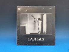 Eleven BAUHAUS records.  four LPs: 