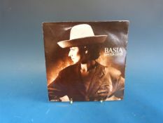 Four bags of 7in singles, each bag conta