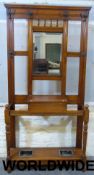 A late 19thC oak hall stand with drip tr