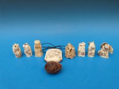 A collection of netsukes and similar ite