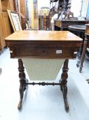 A 19thC walnut foldover games table with