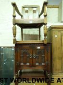 Reproduction carved cabinet and an oak e