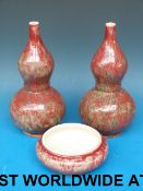 A pair of Chinese gourd vases (22cm tall
