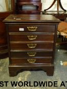 A Henry Stone & Son five drawer music ca