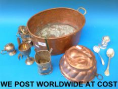 A silver pepper pot and two spoons toget