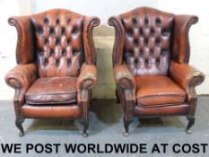 Three wing back leather chairs