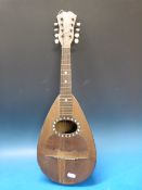 A Neopolitan late 19thC round backed man