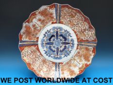 A large 19thC Japanese Imari charger (49