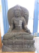 An Indonesian volcanic stone carved figu