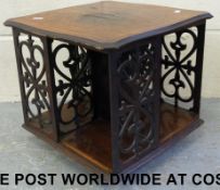 A rosewood tabletop revolving bookcase w