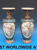 A pair of Japanese cloisonne on pottery