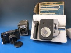 A boxed Rollsmat Zoom 8EE camera togethe