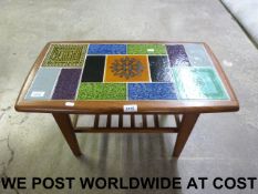 A retro teak tile inset coffee table (le