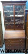 A Georgian mahogany bureau bookcase with