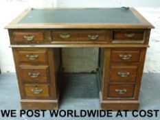 A 19thC mahogany twin pedestal desk widt