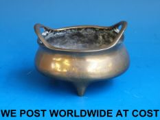 An 18th/19thC Chinese bronze tripod cens