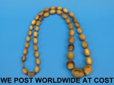 A necklace of oval horn beads