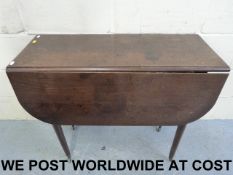 A Georgian mahogany drop leaf table rais