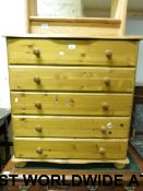 A pine chest of five long drawers (width