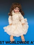 An Armand Marseille bisque headed doll w
