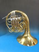 A French horn in F and Bb with rotary va