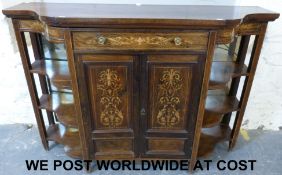 A 19thC rosewood credenza with foliate i